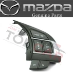 New Genuine Mazda Steering Switch No. Audio GPE1-66-4M3. Fixed Price $194.55.
